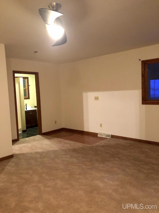 view of carpeted spare room