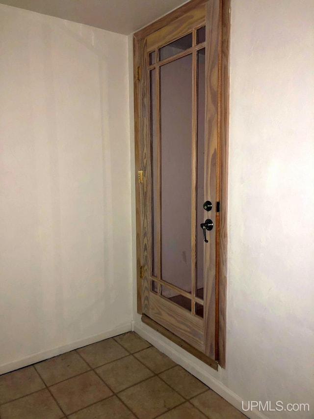 bathroom with tile patterned flooring