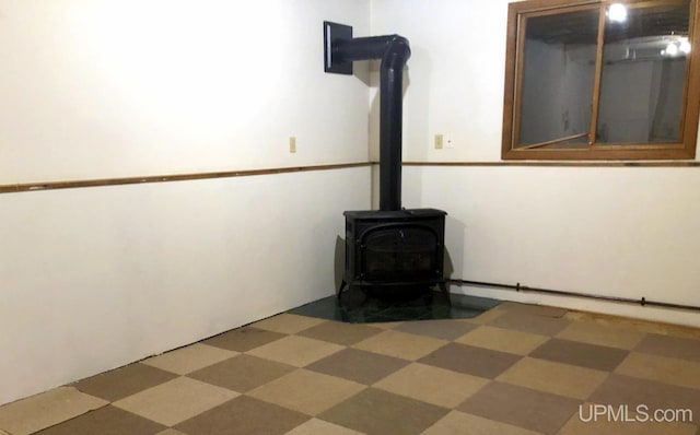 interior details featuring a wood stove