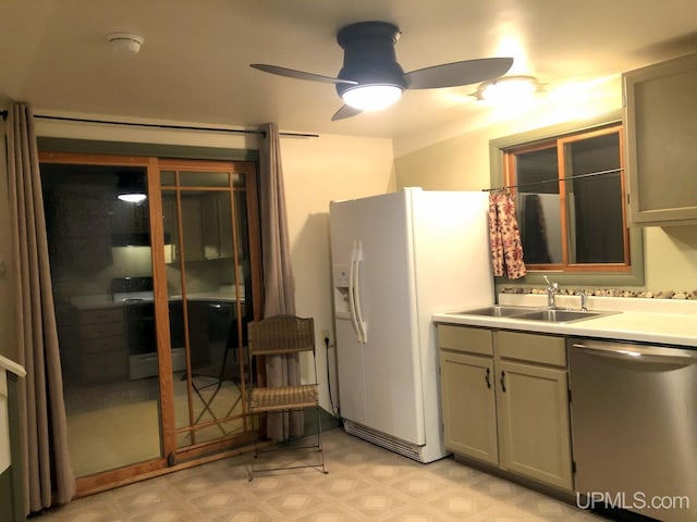 kitchen featuring stainless steel dishwasher, ceiling fan, white fridge with ice dispenser, and sink