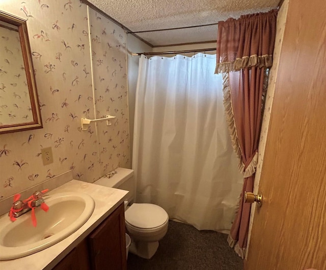 full bathroom with vanity, shower / tub combo, a textured ceiling, and toilet