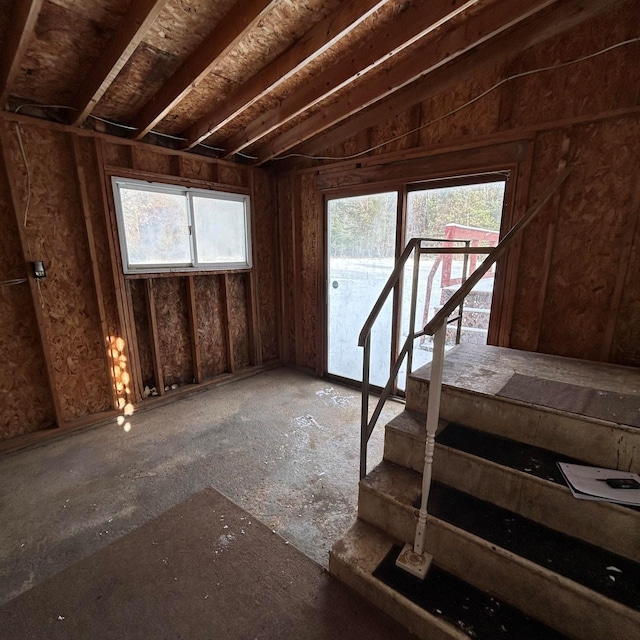 misc room with lofted ceiling