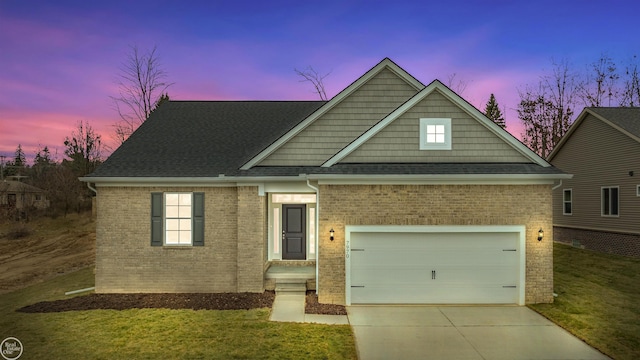 view of front of house with a yard