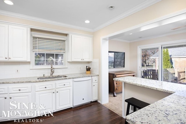 kitchen with light stone countertops, dark hardwood / wood-style flooring, sink, dishwasher, and white cabinetry