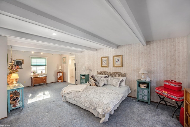 carpeted bedroom with beam ceiling