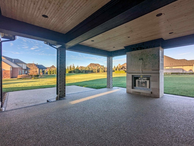 view of patio with a tile fireplace