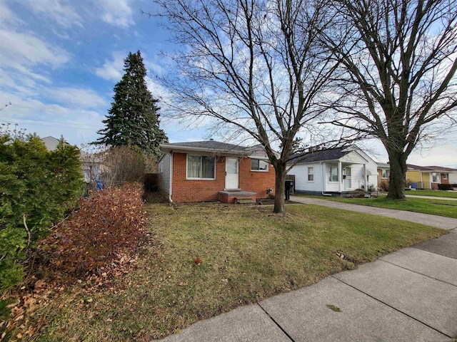 view of front of property with a front lawn