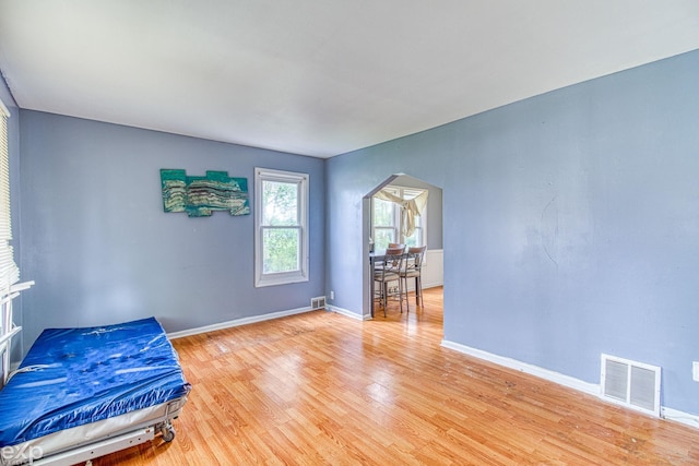 interior space with hardwood / wood-style floors