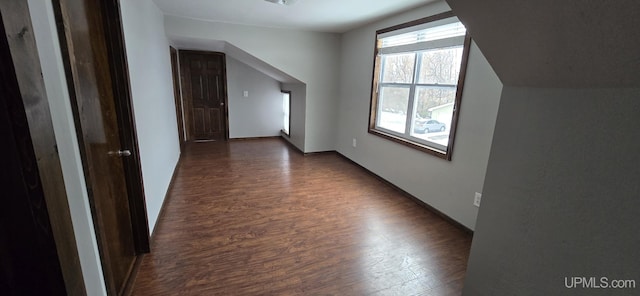 bonus room featuring dark hardwood / wood-style floors