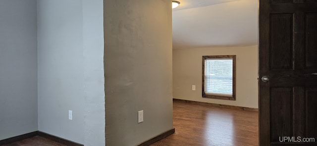 unfurnished room featuring hardwood / wood-style floors