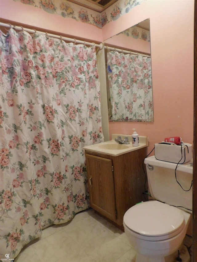 bathroom with vanity and toilet