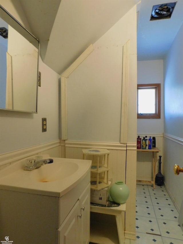 bathroom with vanity and tile patterned floors