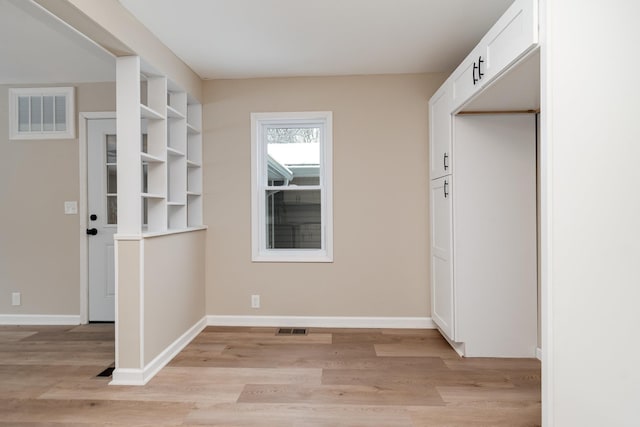 interior space with light hardwood / wood-style floors