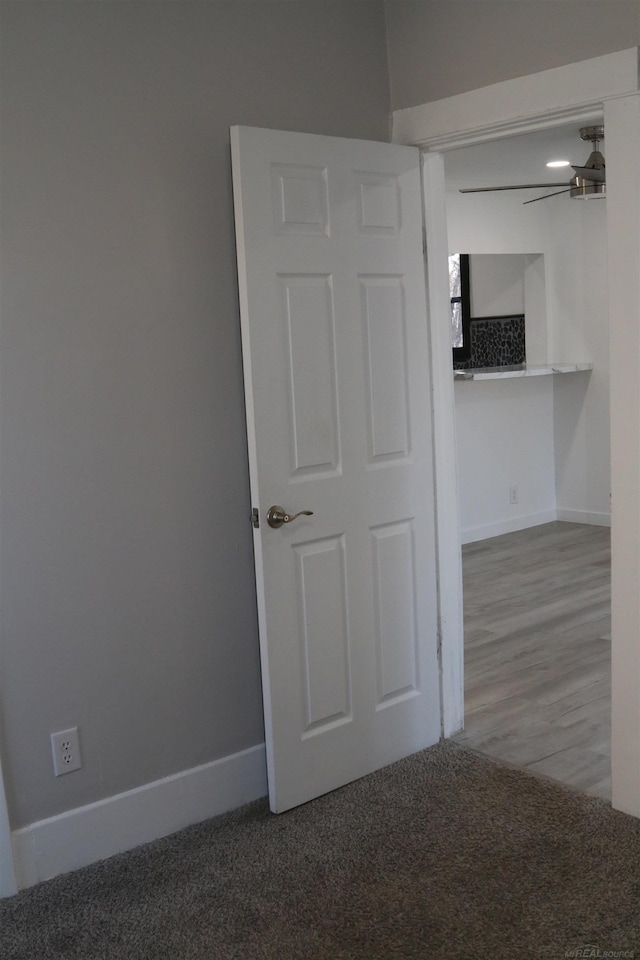 spare room with ceiling fan and light hardwood / wood-style flooring