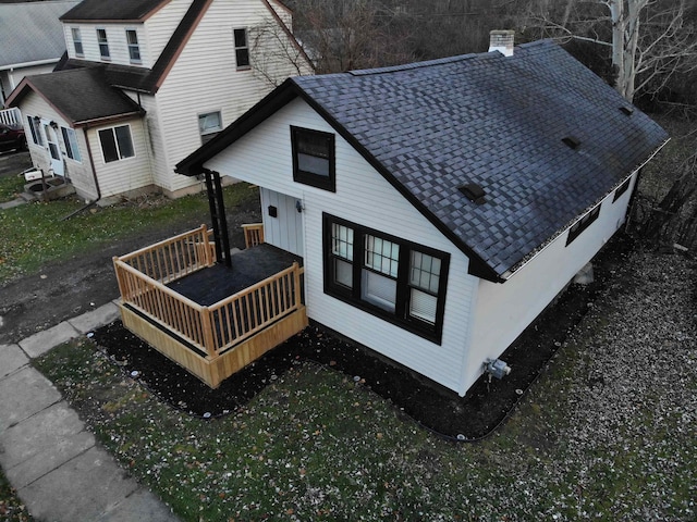 rear view of house with a porch