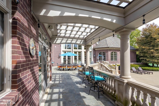 view of patio featuring a pergola