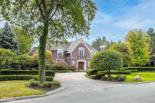 view of front of home with a front yard