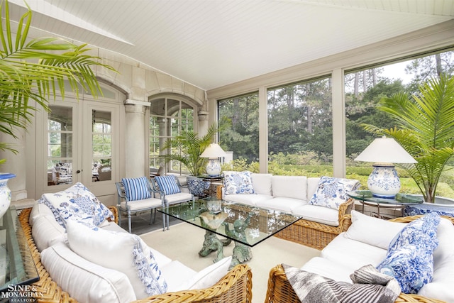 sunroom with french doors and lofted ceiling