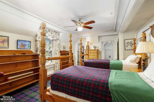 bedroom with ceiling fan and ornamental molding