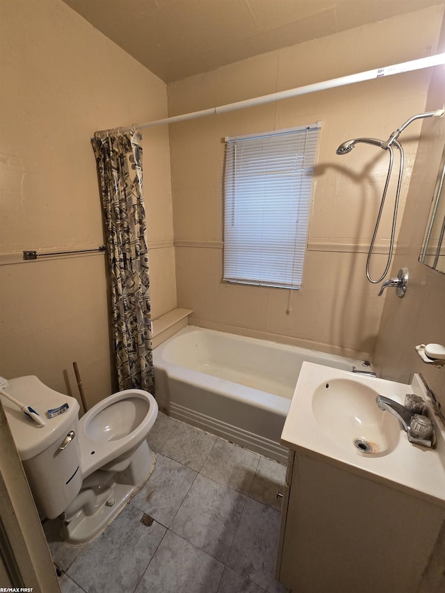 full bathroom featuring tile patterned floors, vanity, shower / tub combo, and toilet