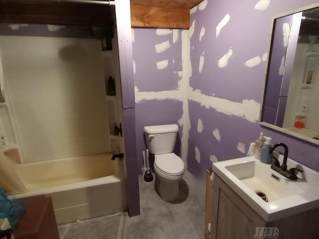 full bathroom featuring toilet, vanity, and tiled shower / bath combo