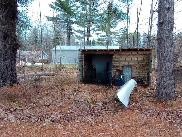 view of entry to storm shelter