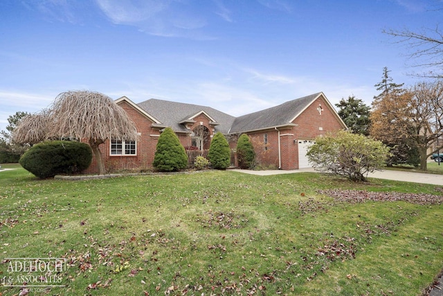 view of front of home featuring a front yard and a garage