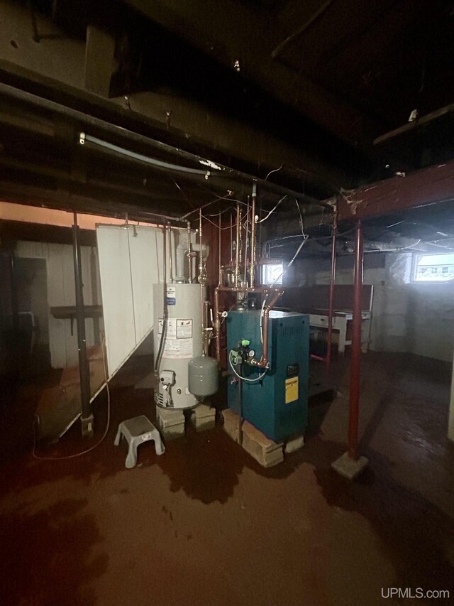 301 E Chocolay St, Munising, MI 49862 - basement with water heater and a heating unit