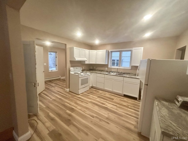 kitchen with white appliances, sink, light hardwood / wood-style flooring, white cabinetry, and plenty of natural light