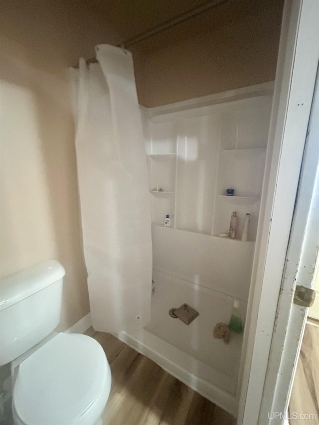 301 E Chocolay St, Munising, MI 49862 - bathroom featuring wood finished floors