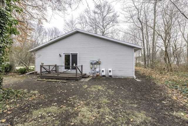 rear view of house with a deck