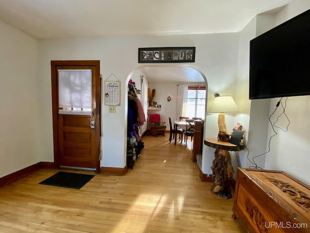 foyer entrance with light wood-type flooring