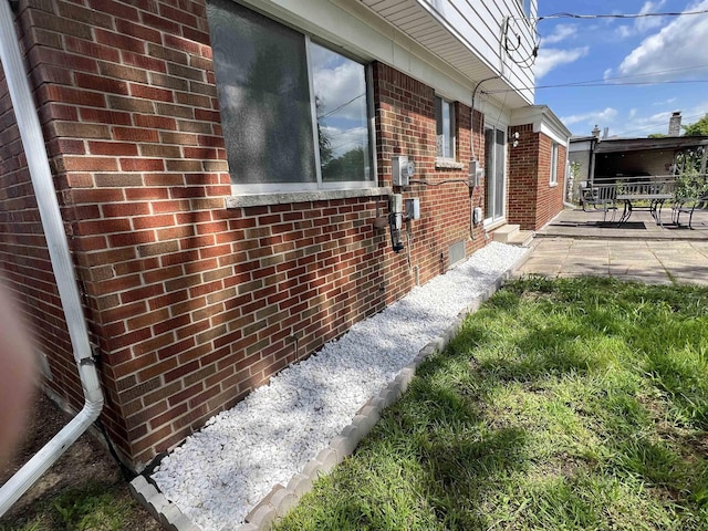 view of home's exterior with a patio