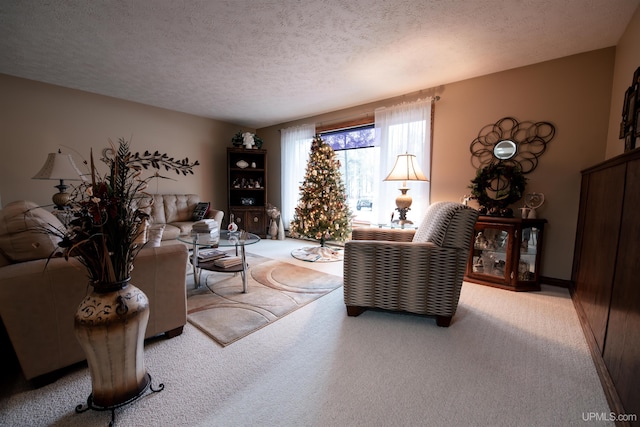 living room featuring light carpet and a textured ceiling