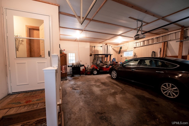 garage featuring a garage door opener