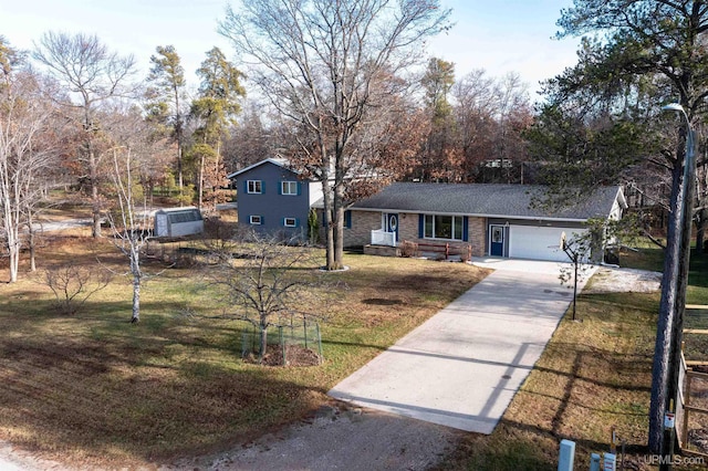 view of front facade featuring a front lawn and a garage