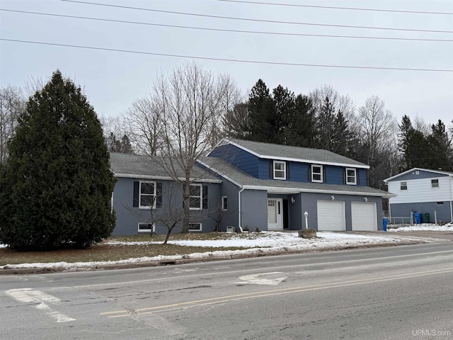 front facade with a garage