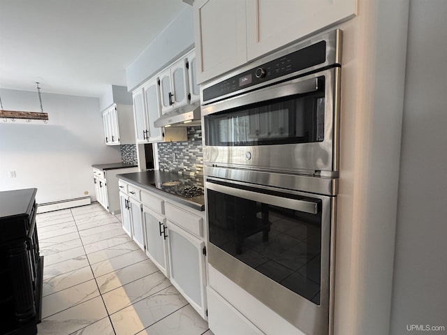 kitchen with a baseboard heating unit, double oven, backsplash, black cooktop, and white cabinets