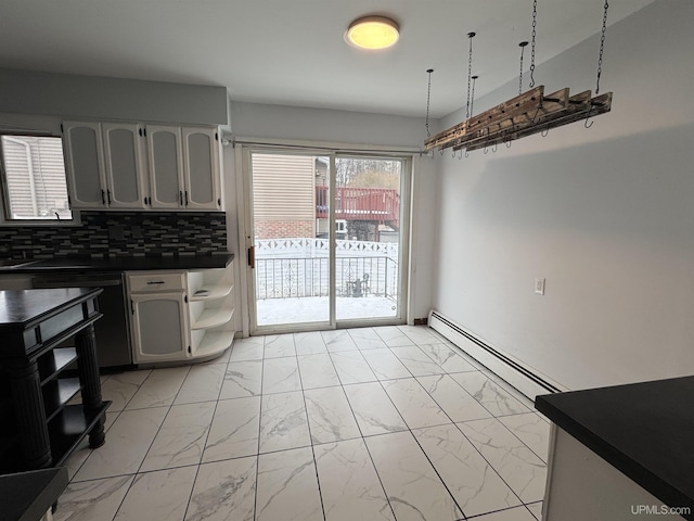 kitchen featuring decorative backsplash, dishwasher, and a baseboard heating unit