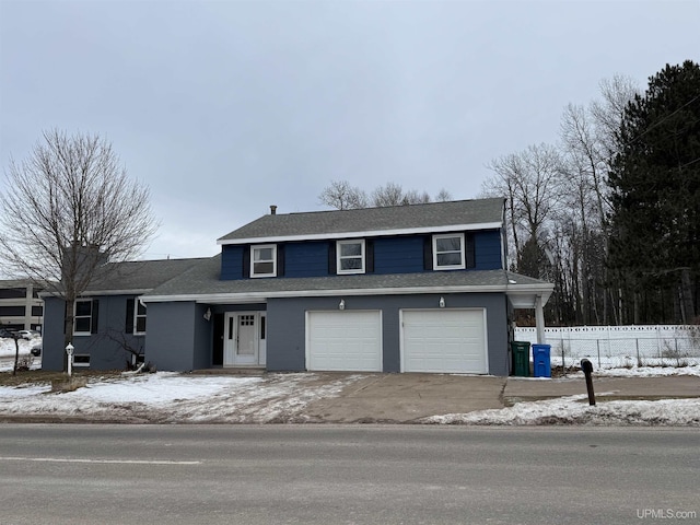 view of front property with a garage