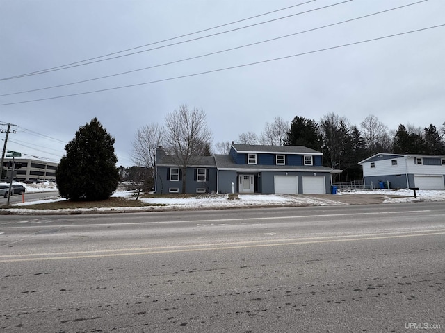 view of front property with a garage