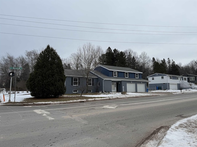 front of property featuring a garage