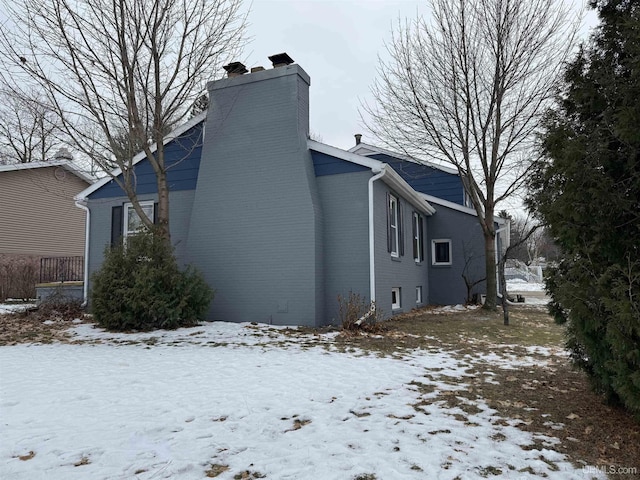 view of snow covered property