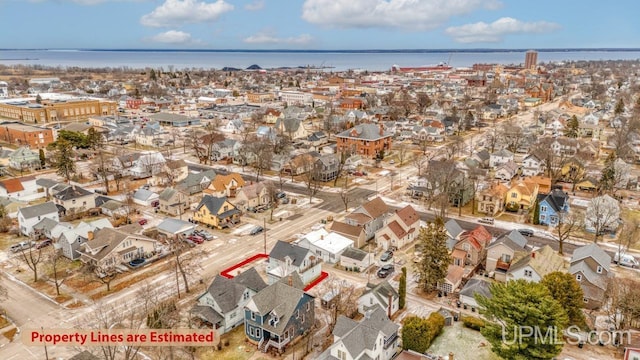 drone / aerial view with a water view