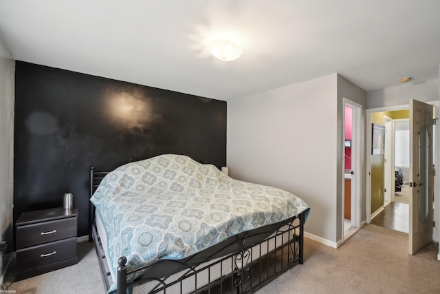 bedroom with light colored carpet