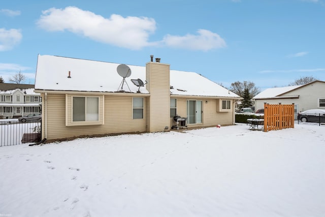 view of snow covered property