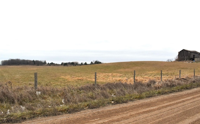 view of yard featuring a rural view