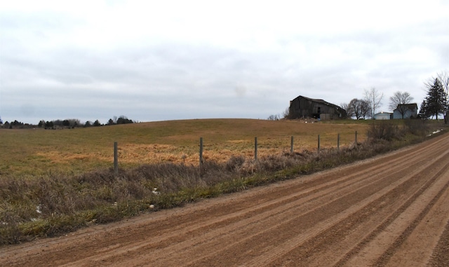 view of road with a rural view