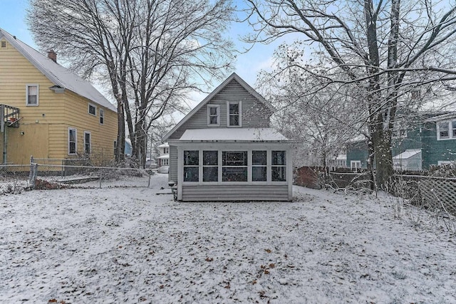 view of snow covered property