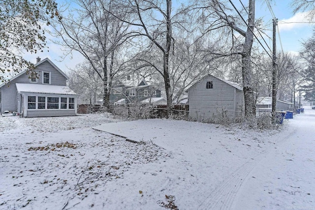 view of yard covered in snow